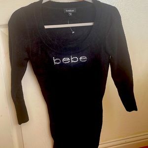 Bebe black full sleeve sweater never worn size medium